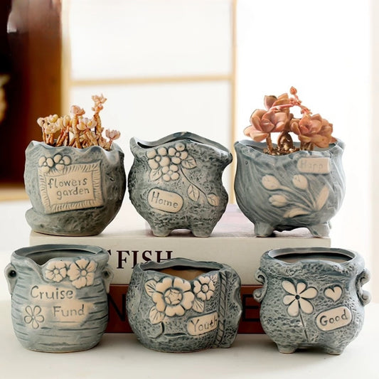 Ceramic Succulent Pot Set – Rustic, Minimalist, Multi-Size A set of unglazed terracotta pots, perfect for succulents and small indoor plants. Simple, rustic design fits any home or office décor.
